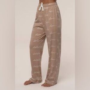 JLUXLABEL Home For The Holidays pajama pants in beige with a cursive print